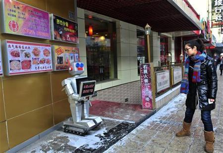 哈尔滨机器人餐厅炒菜送餐全机器人服务图